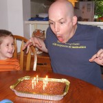 Robbie prepares to blow out his candles